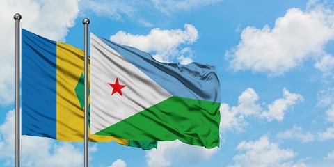 Saint Vincent And The Grenadines and Djibouti flag waving in the wind against white cloudy blue sky together. Diplomacy concept, international relations.