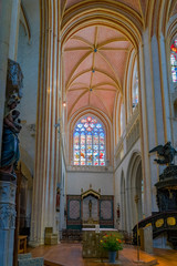 interior view of the Cathedral of Saint Corentin, Quimper in Brittany with a view of the altar