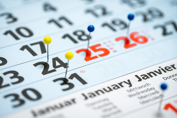 calendar with pins marking the christmas holidays and new years eve of 2019