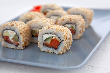 California sushi with sesame. Salmon Rolls