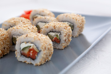California sushi with sesame. Salmon Rolls