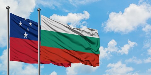 Samoa and Bulgaria flag waving in the wind against white cloudy blue sky together. Diplomacy...