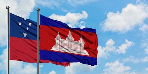Samoa and Cambodia flag waving in the wind against white cloudy blue sky together. Diplomacy...