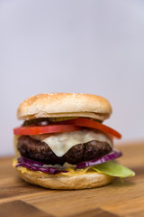 Hamburger on the wooden table