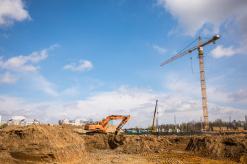 Construction machinery at the construction site of the house