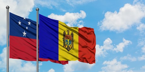 Samoa and Moldova flag waving in the wind against white cloudy blue sky together. Diplomacy concept, international relations.