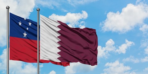 Samoa and Qatar flag waving in the wind against white cloudy blue sky together. Diplomacy concept, international relations.