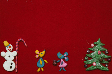 Plasticine applique on velvet paper on New Year's theme