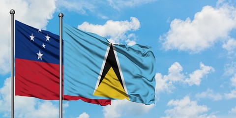 Samoa and Saint Lucia flag waving in the wind against white cloudy blue sky together. Diplomacy concept, international relations.
