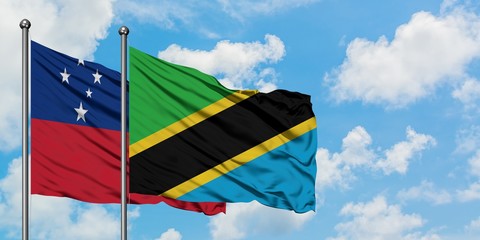 Samoa and Tanzania flag waving in the wind against white cloudy blue sky together. Diplomacy concept, international relations.