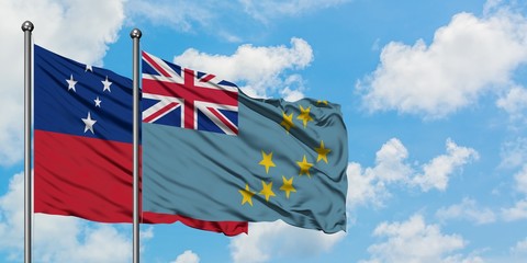 Samoa and Tuvalu flag waving in the wind against white cloudy blue sky together. Diplomacy concept,...