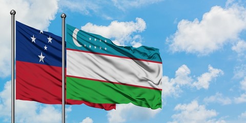 Samoa and Uzbekistan flag waving in the wind against white cloudy blue sky together. Diplomacy...
