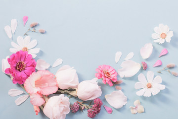 summer flowers on blue paper background