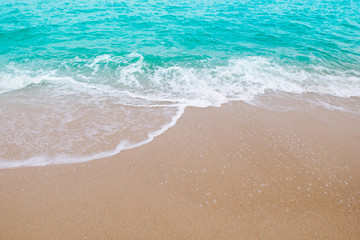 Fototapeta na wymiar beautiful sea wave on sand beach