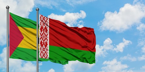Sao Tome And Principe and Belarus flag waving in the wind against white cloudy blue sky together. Diplomacy concept, international relations.