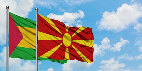 Sao Tome And Principe and Macedonia flag waving in the wind against white cloudy blue sky together. Diplomacy concept, international relations.