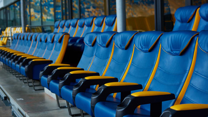 blue chair on sport stadium