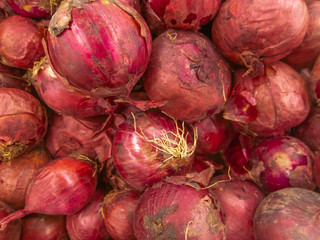 Purple onion background in pile