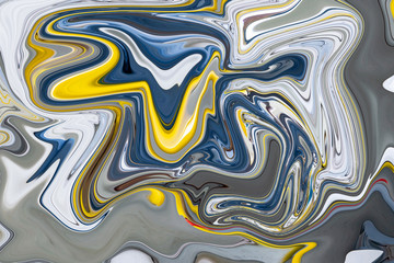 Fototapeta na wymiar Abstraction in multicolored smooth lines of a wavy texture. Blurry colors of a colored background.