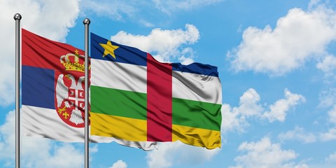 Serbia and Central African Republic flag waving in the wind against white cloudy blue sky together. Diplomacy concept, international relations.