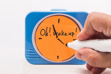 Alarm clock with the words Oh wake up