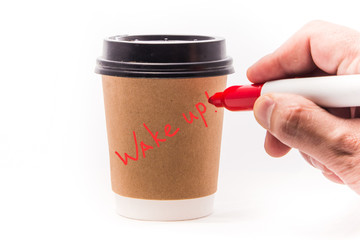 A cup of morning coffee with the words wake up
