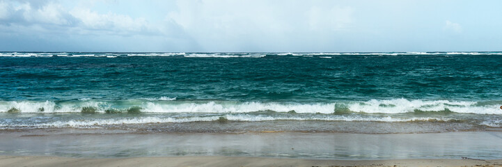 Panoramic photo of a surf wave