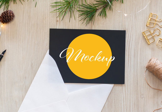 Black Horizontal Postcard with Envelope Top View Mockup