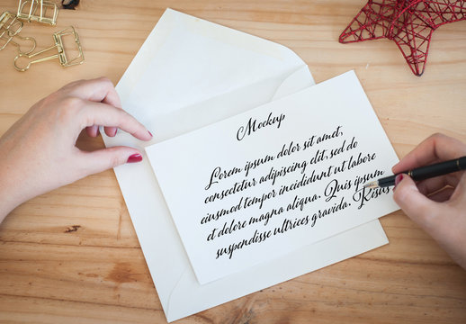 Hands Writting a Letter on a Desktop Mockup
