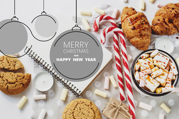 Winter or Christmas composition with hot cocoa, marshmallow, cookies and candy on white background. Christmas, winter, new year concept. Flat lay, top view, copy space