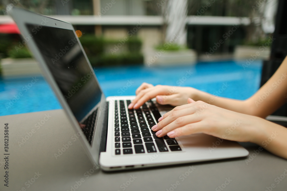 Canvas Prints fingers typing on computer keyboard sunny day