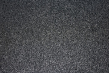 Fototapeta na wymiar Background texture of a dark gray carpet