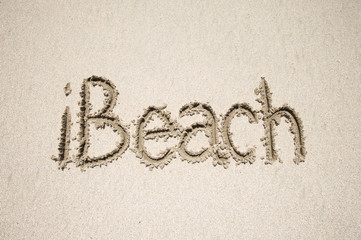 Sunny modern social media travel message iBeach handwritten on smooth sand beach