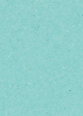 natural turquoise paper texture. sheet of vintage turquoise kraft paper background. template for design or text. mockup, copy space