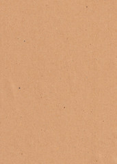 Fototapeta na wymiar brown craft paper texture. brown cardboard background. high resolution scanned sheet of craft paper. template for design or text. mockup, copy space