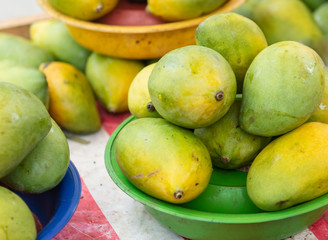 Table with mango piled at the street market