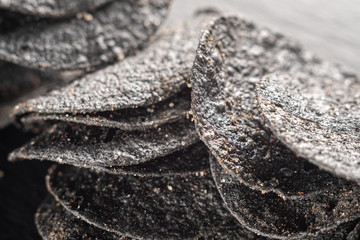 background of many black chips with spices