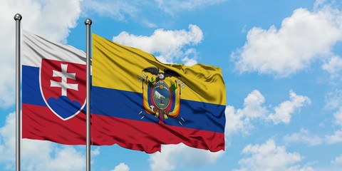 Slovakia and Ecuador flag waving in the wind against white cloudy blue sky together. Diplomacy concept, international relations.