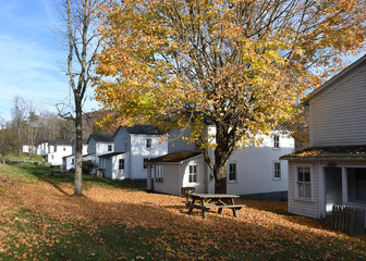 Fototapeta na wymiar restored company houses in Cass, West Virginia- now used as rental cabins by the state park system- in autumn