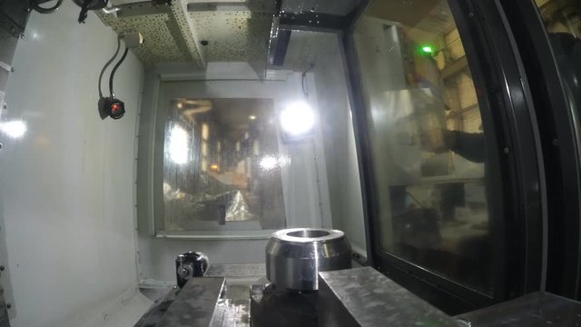 The process of processing metal billets in old machine tools of heavy engineering plants. Moving parts of processing machines