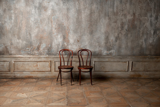 Chair on vintage wall background