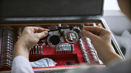 Old retro optometrist diopter tool in an optician laboratory