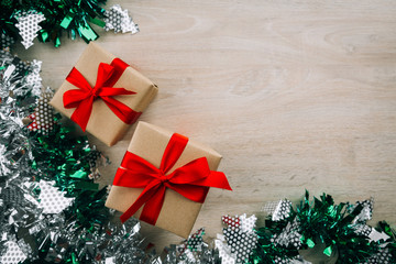 Brown gift box on a wooden floor