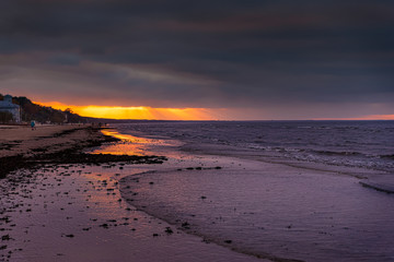 Beautiful purple sunset on the beach in Jurmala, Latvia