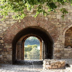view through one of the gates, made in brick and stone wall, on Kalemegdan fortress, Belgrade, Serbia 