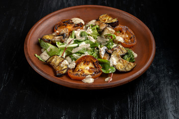 Grilled vegetable salad. Salad of barbecued zucchini, eggplant, onion.