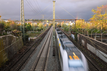 Fototapeta na wymiar Regionalbahn überquert die Mosel in Koblenz - Stockfoto