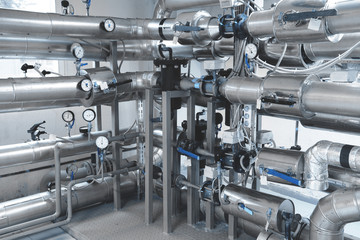pipe lines for heat supply with pressure gauges, manometers, thermocouples installed in the boiler...