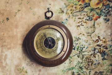 Dusty vintage barometer in old house, the writing is in french - obrazy, fototapety, plakaty