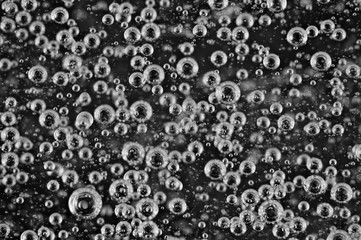 Black and white Small and Large Oxygen Bubbles in Liquid
